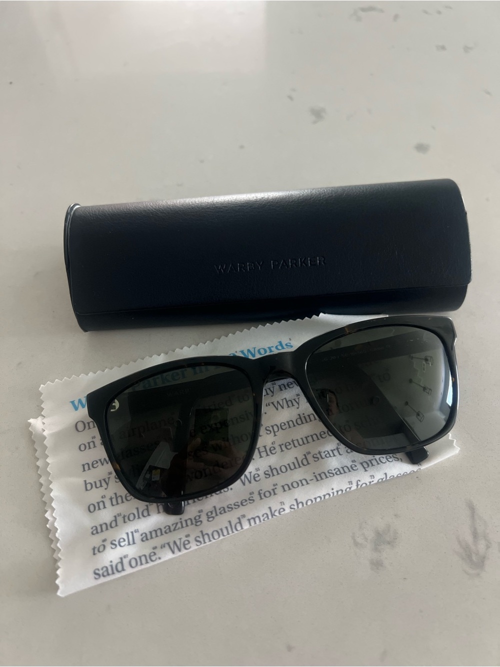Warby Parker Tortoise Frame Sunglasses with Dark Lenses